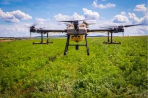 Precision Crop Care Drone spraying in urban farming